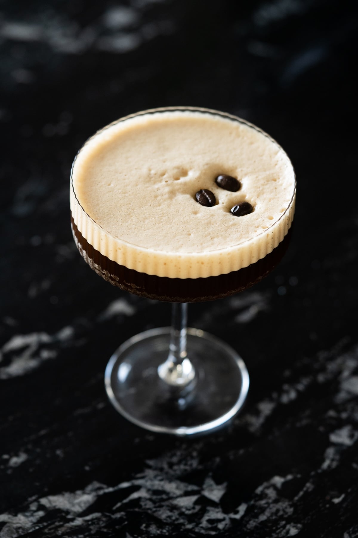 Sugar free & keto espresso martini garnished with three coffee beans