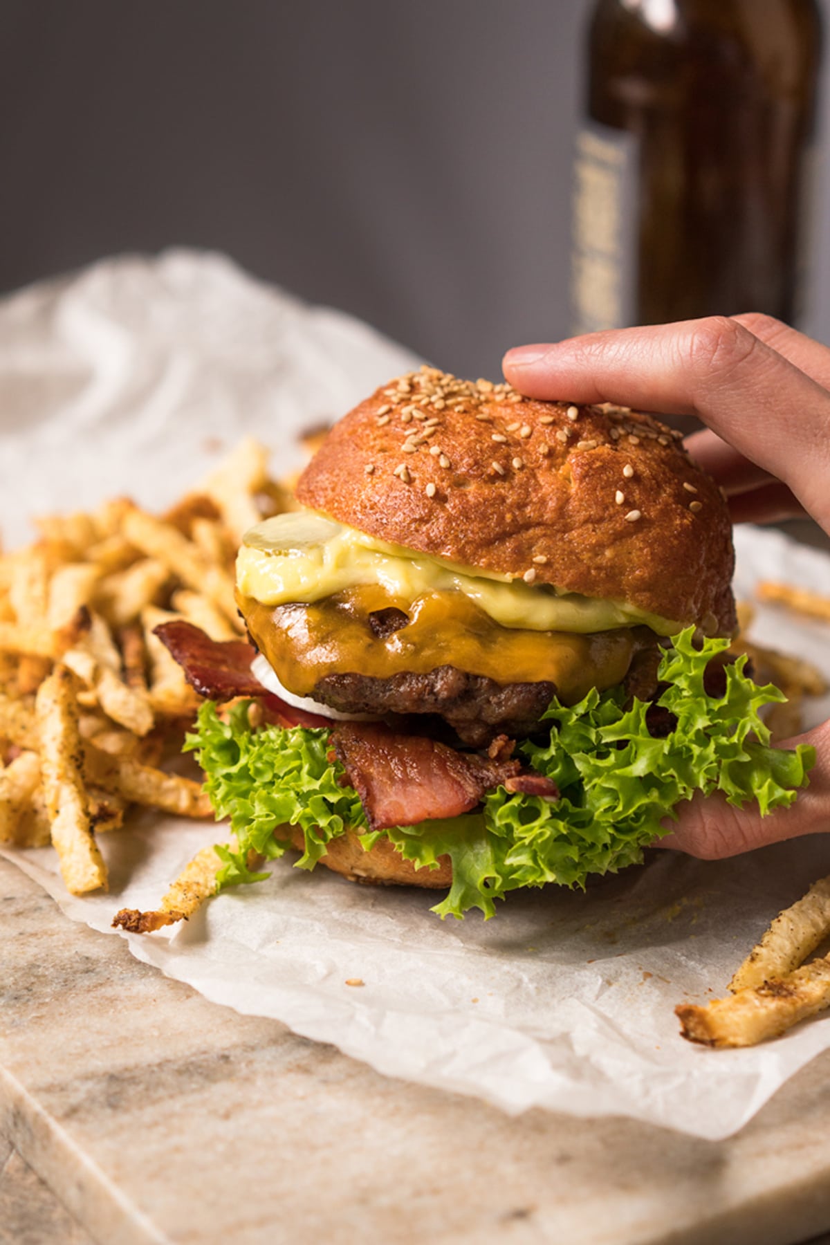 Using the keto wholewheat buns to make a burger