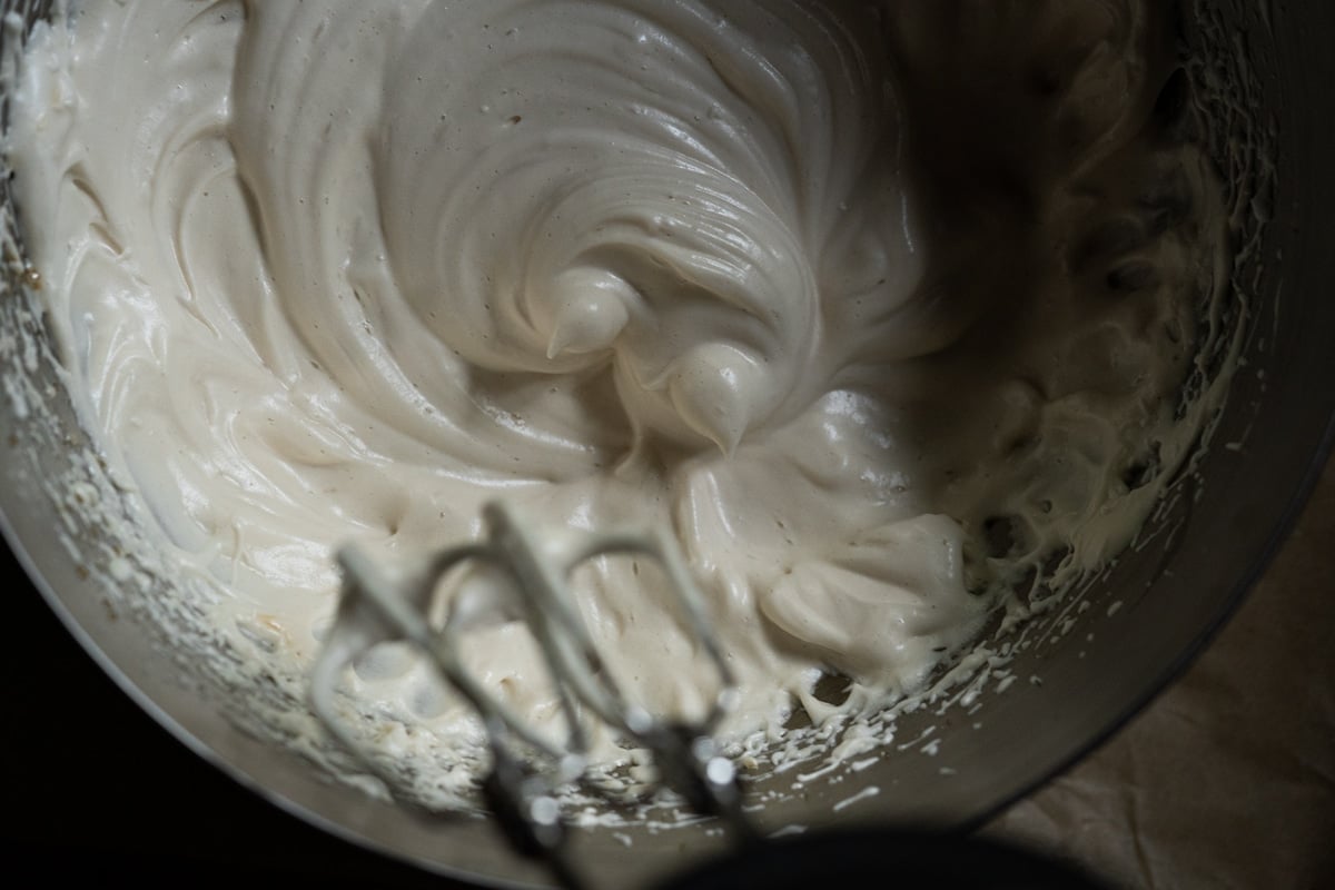 Closeup of the shiny resulting texture after mixing in the maple syrup into the egg whites
