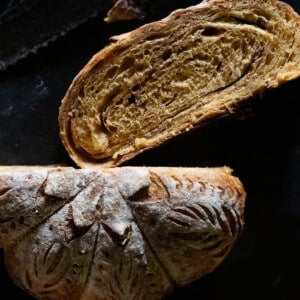 Pumpkin sourdough with a sugar cinnamon swirl sliced and showing the pumpkin shaping