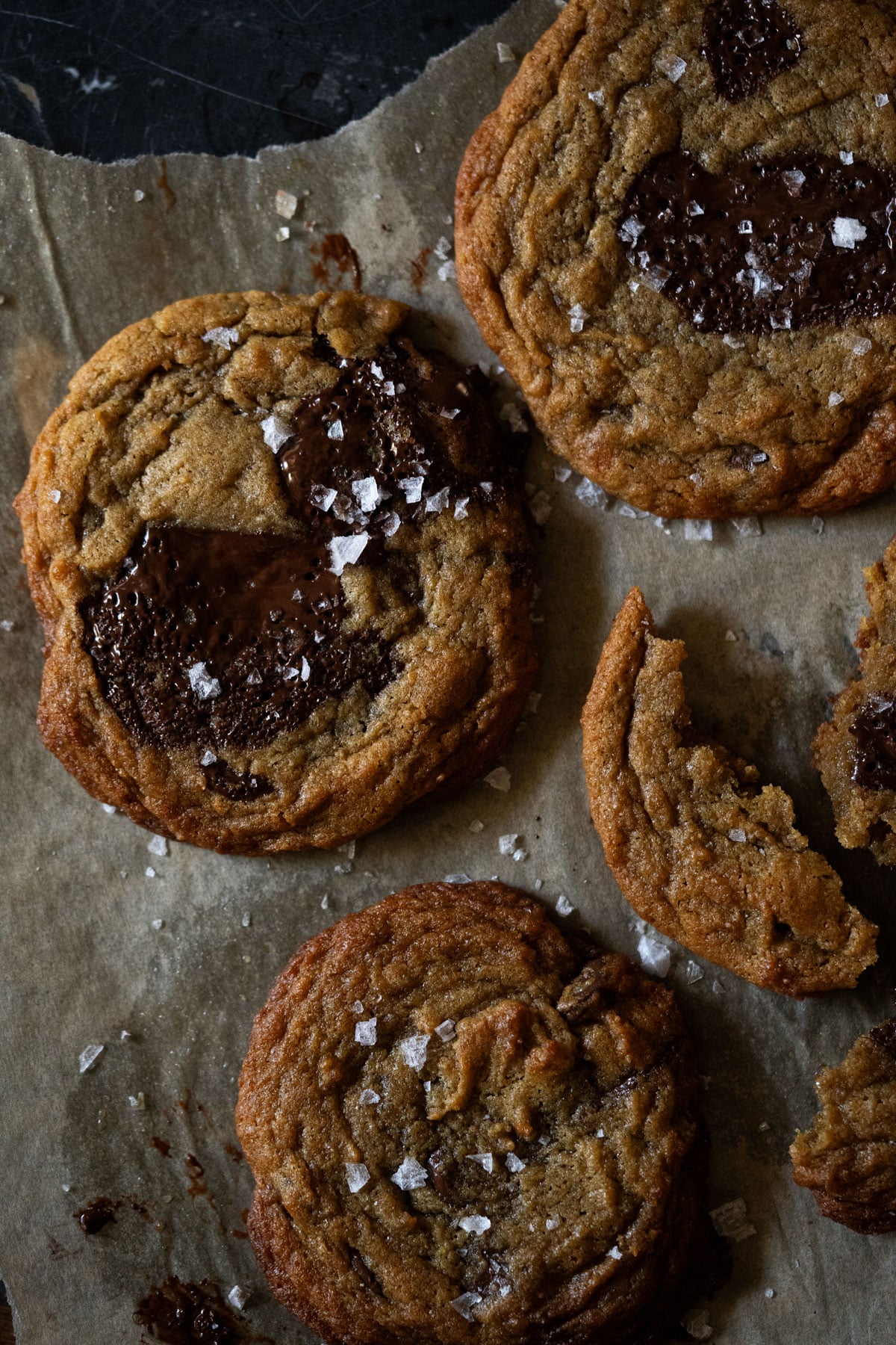 Sourdough discard chocolate chip cookies freshly baked with a sprinkle of flaky sea salt